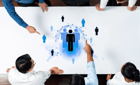 A concept of global leadership and network influence. A central team or individual connects with a professional network distributed across the world map, representing worldwide reach.の写真素材