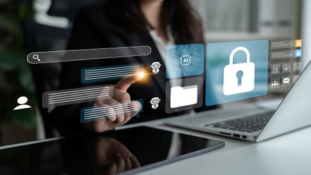 A businesswoman engages with a digital security interface in a modern office, highlighting the importance of data protection and innovation in today technology-driven world.の写真素材