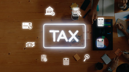 An engaging workspace with a central neon "TAX" sign and various icons. This image illustrates the complexity of tax planning, finance, and documentation. Rasterの写真素材