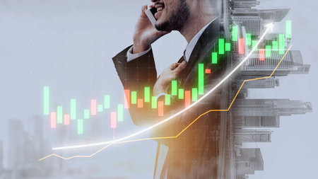 A confident businessman communicates on his phone, with a vibrant stock market graph overlay...