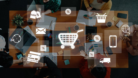 Aerial view of a collaborative office workspace showcasing a shopping cart icon amidst various...