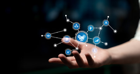 A close-up of a hand showcasing glowing digital icons that represent different sectors, symbolizing...