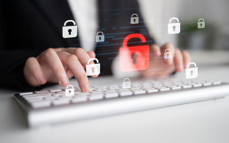 Digital security concept illustrating a cybersecurity breach, with a red unlocked padlock indicating...