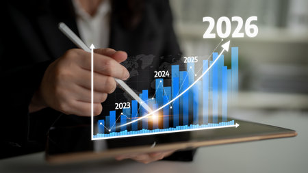 A business professional uses a tablet to analyze financial growth through projected charts in a...
