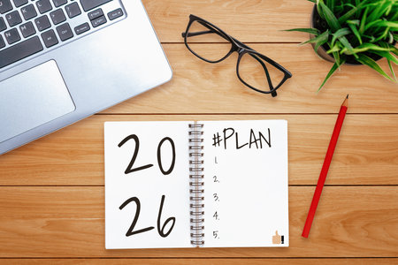 2026 Happy New Year Resolution Goal List and Plans Setting - Business office desk with notebook...