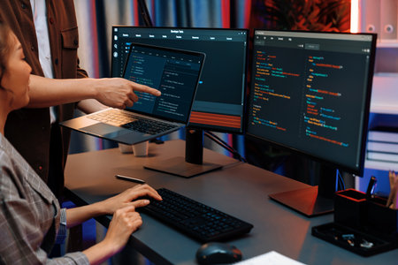 Serious of IT developers discussing intelligent website development coder system running data online...