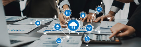 A dynamic office scene showcasing a team collaborating on cloud computing technology, working...