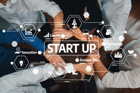 A dynamic start-up strategy meeting showcasing hands together among professionals, enhanced by...