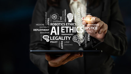 A business professional interacts with a tablet displaying key concepts surrounding AI ethics, emphasizing the importance of responsibility and transparency in technology development. Tesselの写真素材