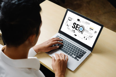 SEO search engine optimization for modish e-commerce and online retail business showing on computer...