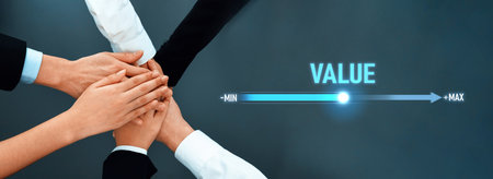 Group of diverse professionals hands uniting on a blue background with a value scale showing minimum and maximum indicators, symbolizing collaboration and teamwork in business.の写真素材