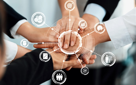 A visual representation of teamwork in a modern office setting, showcasing diverse hands together...