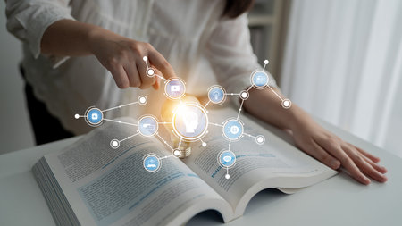 A person highlights a page in an open book while digital icons and a glowing light emerge,...
