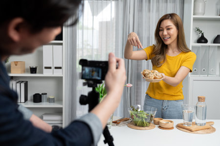 Asian beautiful woman food specialist presenting healthy meal wholegrain bun bread basket on live...