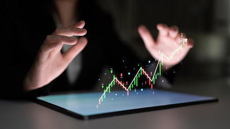 A stock market trading candlestick chart showing a bull market trend. A concept of financial...