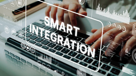 Smart Integration Concept with Person Typing on Laptop Surrounded by Digital Analytics and Data...