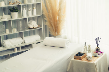Exquisite display of beauty treatment and spa salon accessories arranged on spa table in luxury spa resort. Relaxing spa massage and recreation background concept. Quiescentの写真素材
