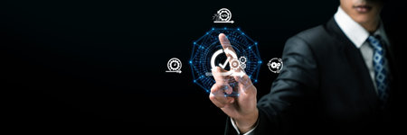 A businessman engages with a digital interface, emphasizing agile methodology and data analysis in a modern technology environment for effective business solutions.の写真素材