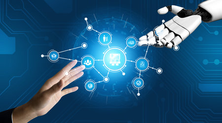 This image showcases the interaction between a human hand and a robotic hand, representing the collaboration between technology and humanity in a digital landscape. Tesselの写真素材