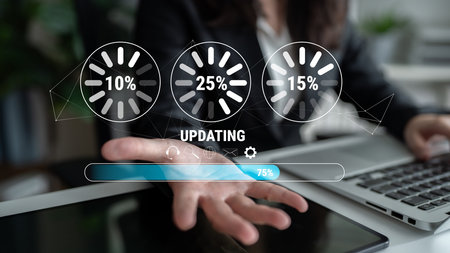 A concept of a system update and software installation. A progress bar and loading icons showing the...