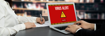 Virus warning alert on computer screen detected brisk cyber threat , hacker, computer virus and...