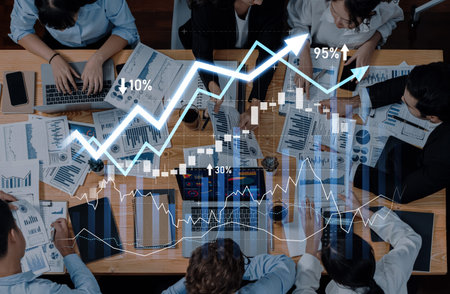A vibrant business meeting scene showcasing a diverse team analyzing growth charts and financial...