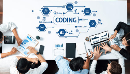 A diverse team collaborates in a modern workspace focusing on coding and development. Visuals...