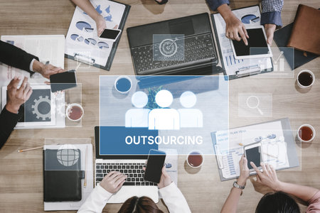Outsourcing concept showing collaboration, delegation, global workforce, productivity, and task...
