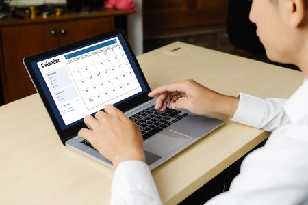Calendar on computer software application for modish schedule planning for personal organizer and online businessの写真素材