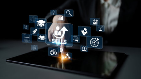 Modern Digital Learning Concept with Skills Icons Highlighted on a Tablet Screen Representing Education and Personal Development in the Digital Age.の写真素材