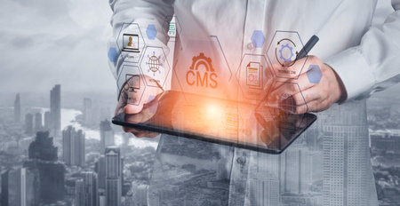 Concept of a Content Management System (CMS). A platform for website administration, digital content creation, workflow management, and e-commerce integration.の写真素材