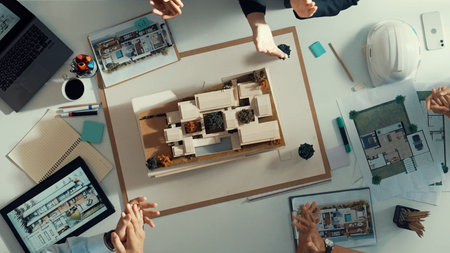 Top view of smart manager clapping hands and putting hands together to celebrate project. Aerial...
