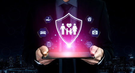 Concept of comprehensive insurance coverage and financial planning. A policy that provides life, health, and asset protection for a family's security and risk management.の写真素材