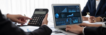 Business intelligence and data analysis concept. Analyst team working on financial data analysis...