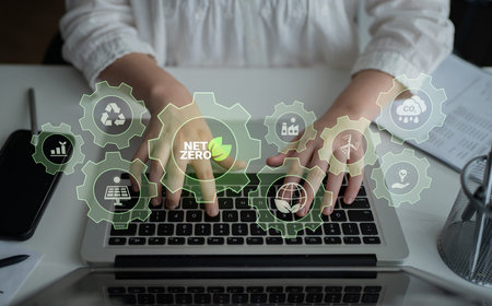 Interconnected green gears with icons representing renewable energy, carbon reduction, recycling,...