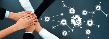 A diverse business team unites in collaboration to promote green initiatives, showcasing hands coming together with icons symbolizing sustainability and responsibility. Amityの写真素材