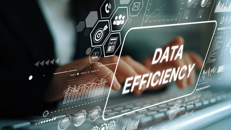 Hands on Keyboard with Graphics Displaying Data Efficiency Metrics and Analytics for Business...