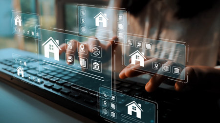 Digital Real Estate Management Concept with Hands Typing on a Keyboard Surrounded by Virtual Property Icons and Graphical User Interface Elements Gluon.の写真素材