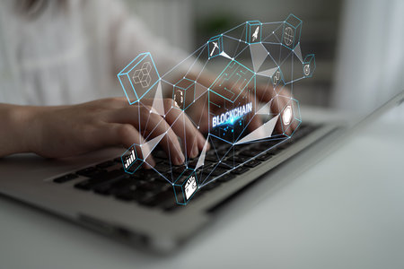 Woman Typing on Laptop with Blockchain Graphics and Digital Icons Representing Technology,...