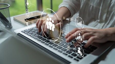 Business teamwork connected around a globe representing cooperation, leadership, and organizational...
