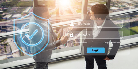 Two business professionals shake hands in a modern office with a digital security login interface...