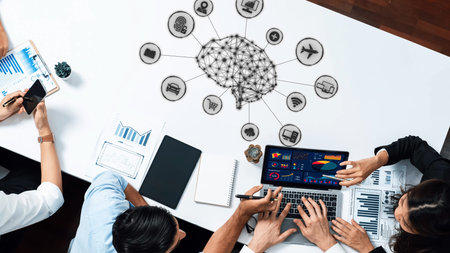 A dynamic business meeting scene showcasing teamwork focused on data analysis, innovation, and...