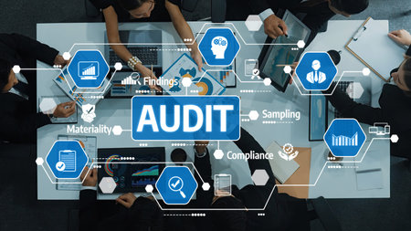 A group of professionals is collaborating on an audit process in a modern office, utilizing digital...