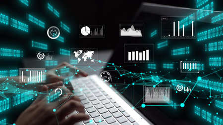 This image showcases hands typing on a keyboard, surrounded by digital data visualizations, graphs,...