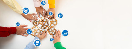A diverse group of hands working collaboratively with gears and icons, symbolizing connection and...