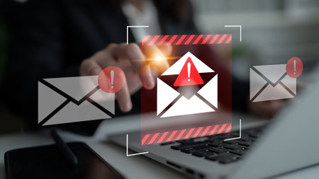 A focused view of a digital environment showing warning alerts on emails, highlighting the urgency...