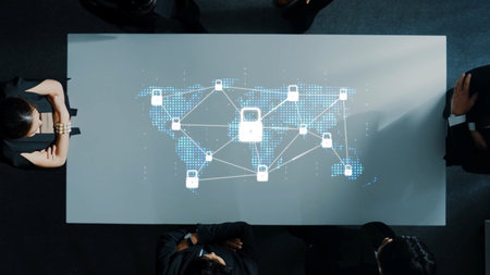 Aerial view of business professionals engaged in a meeting focused on cybersecurity solutions,...