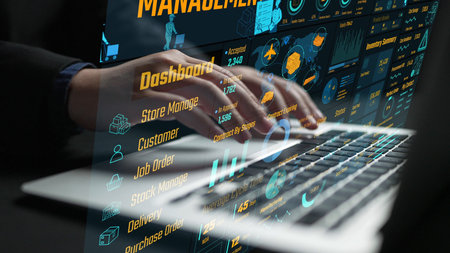 Hands typing on a laptop display a futuristic dashboard filled with analytics and management tools...