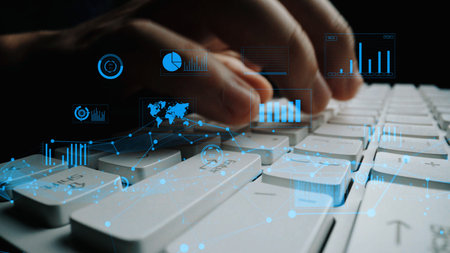 A close-up view of fingers typing on a modern keyboard, surrounded by digital data visualizations...