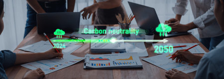Professionals engage in a collaborative meeting focused on achieving carbon neutrality by 2050,...